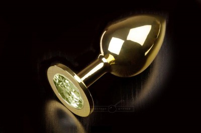 Большая золотая анальная пробка с закругленным кончиком и кристаллом - 9 см., производитель: Пикантные штучки